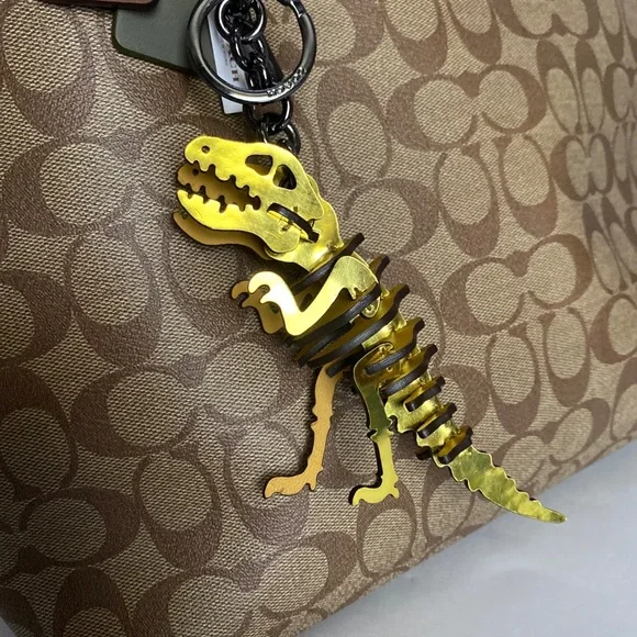 Coach Gold Metallic Rexy Dinosaur Puzzle Fob Small Bag Charm Keychain NWOT Leath - Picture 11 of 11